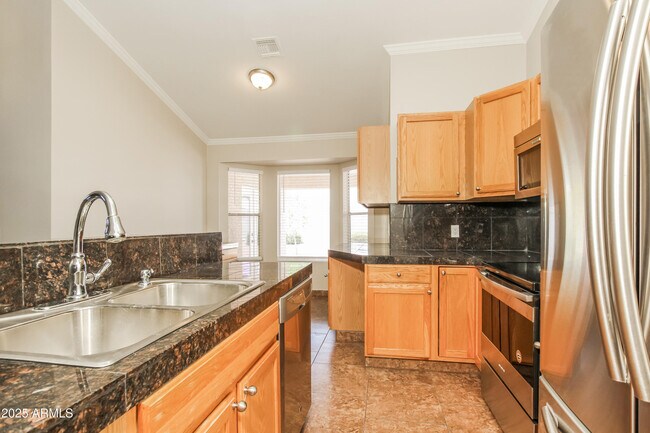 Building Photo - 6410 W Sandra Terrace