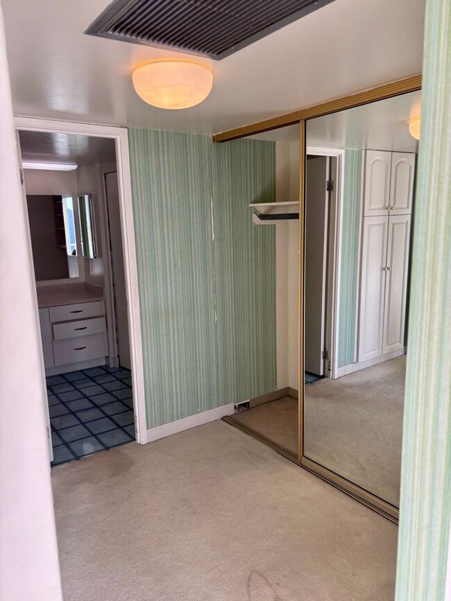 Building Photo - Available Now | One Bedroom, One Bathroom Condo with 1 Assigned Parking Stall