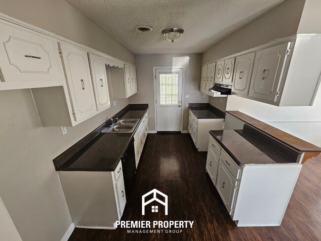 Building Photo - Stunning 3BR/2BA Home | 1,644 Sq Ft, Floor-to-Ceiling Stone Fireplace & High Ceilings