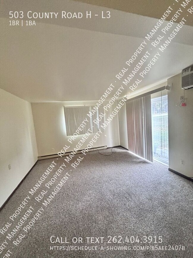 Building Photo - Lower 1 Bedroom Apartment @ Creekside Apar...