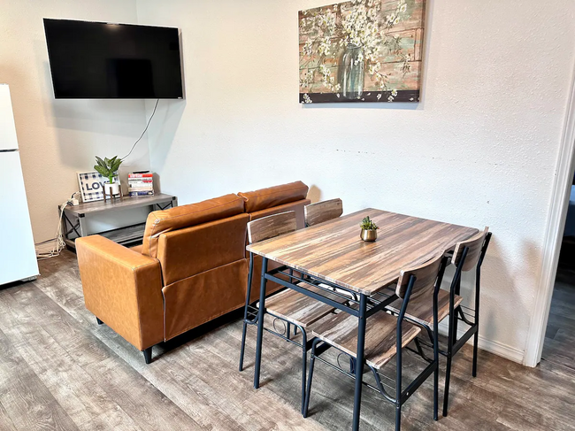 Living Area with Dining Table - 3827 Monroe Ave