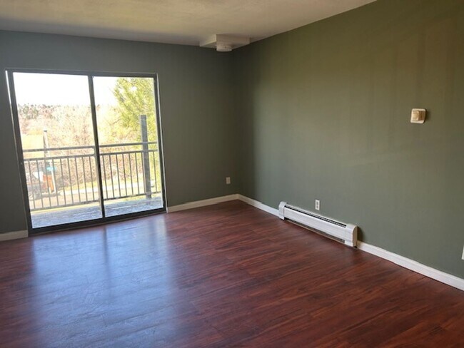 Building Photo - Top-Floor Condo with Trail Access + Community Perks!