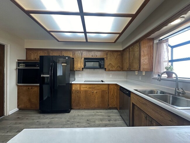 Building Photo - New exterior paint!  LVP flooring! Large y...