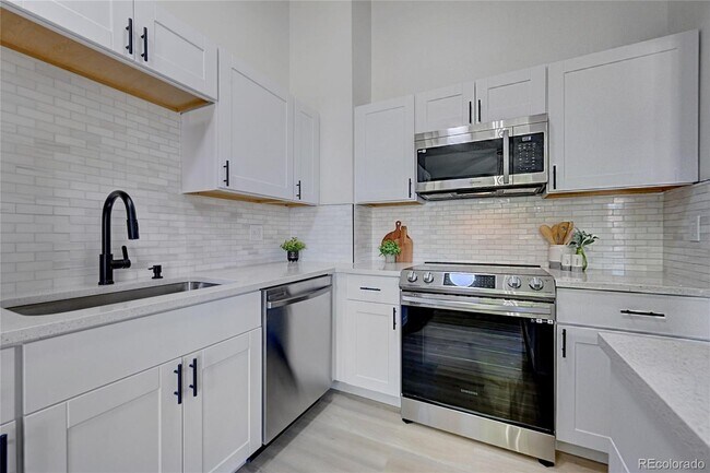 Building Photo - 12028 E Harvard Ave