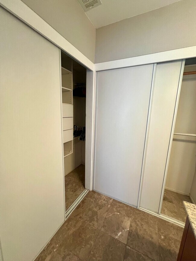 Building Photo - Furnished, 1-Year Long-Term Rental