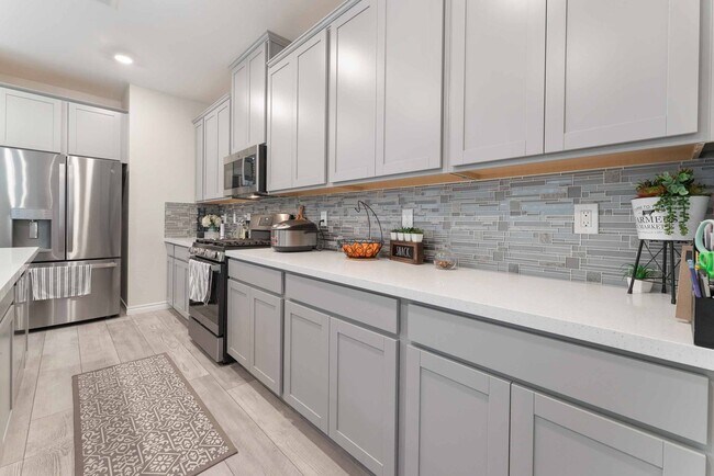 Building Photo - Modern Luxury Living: Spacious Retreat with Next-Gen Suite!