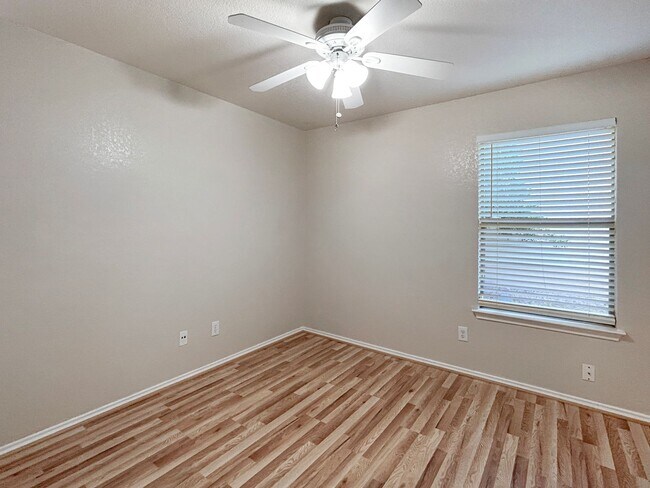 Building Photo - Northeast 3/2 with New Bedroom Floors & Covered Patio