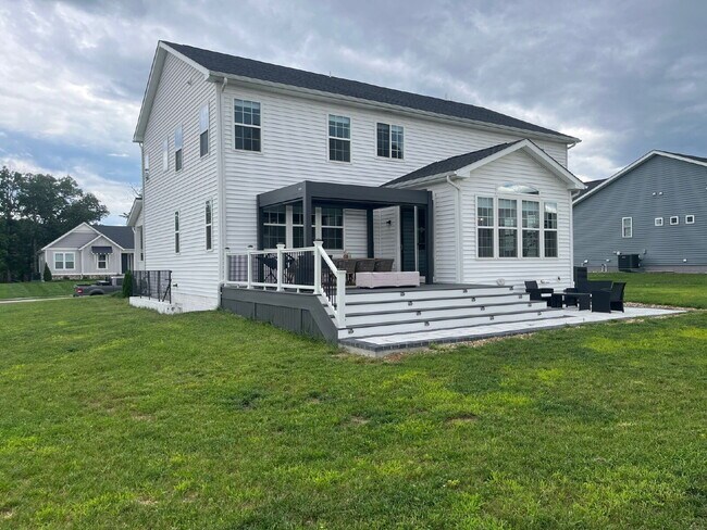 Building Photo - Stunning 5-Bedroom Custom Home with Solar, EV Charging & Private Media Room