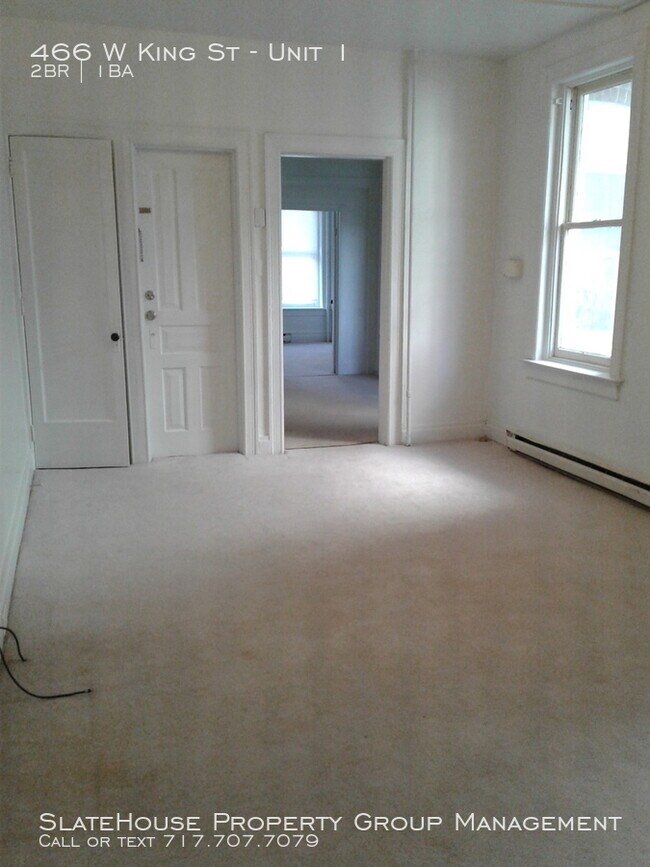 Building Photo - First floor two bedroom with yard!