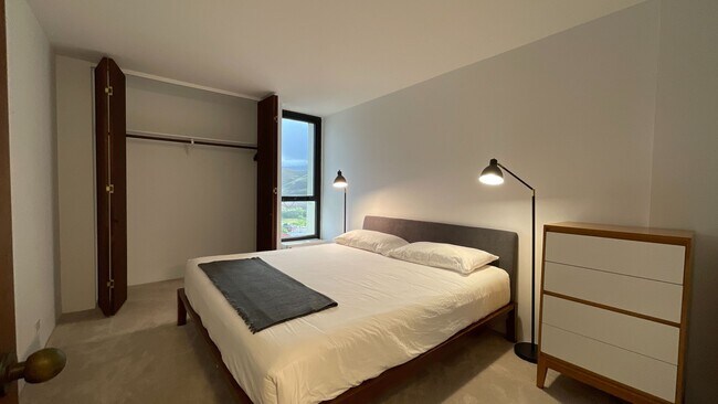 Building Photo - Rare High-Floor Corner Residence at Windward Passage | Ocean & Mountain Views