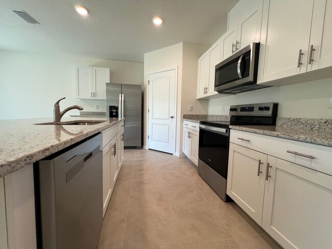 Building Photo - Brand New! 4 Bedroom, 2 Bathroom home in t...