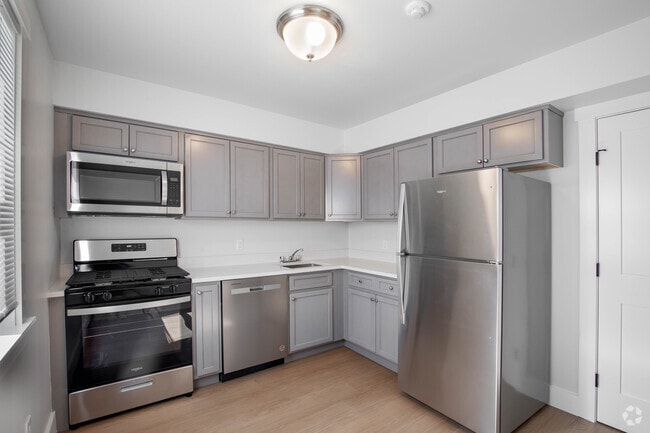 1 BR, 1 BA - 830 SF - Woodhull Gardens - Kitchen - Woodhull Gardens