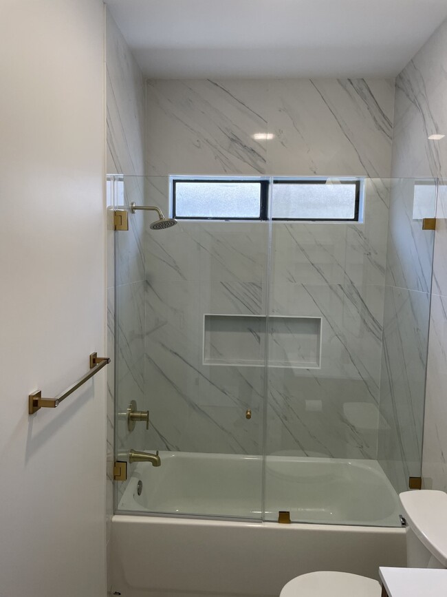 Floating shower doors - 7632 Topanga Canyon Blvd