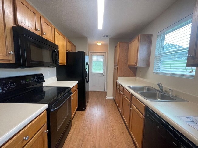 Building Photo - PRE-LEASING FOR AUGUST 2025!  1/2 OFF SECU...