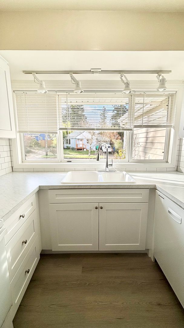 Building Photo - Recently Renovated House With Fenced Back Yard, Attached Garage, and Basement