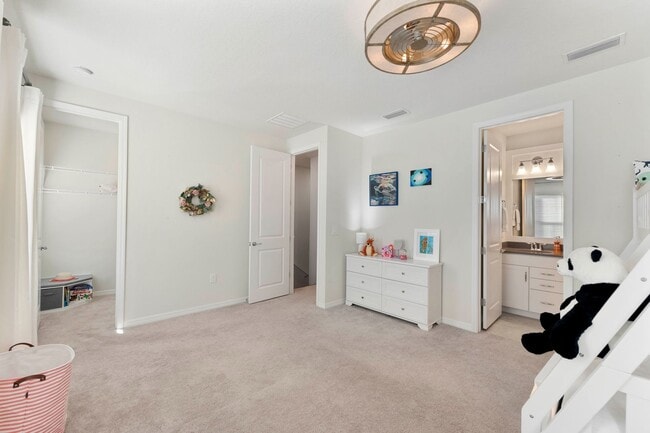 Building Photo - Introducing a captivating 3-story townhome...