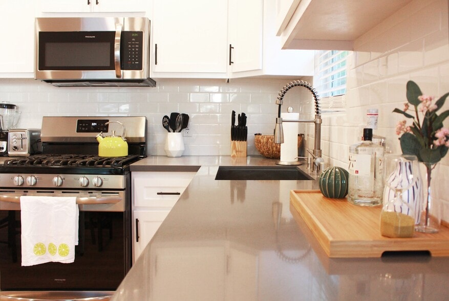 Deep farmhouse sink in kitchen. - 2147 S Orange Dr