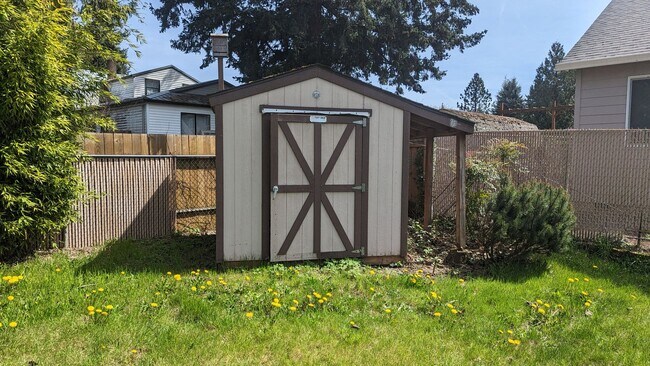 Building Photo - Spacious Three Bedroom with Large Backyard...