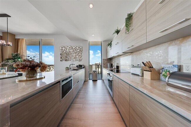 Building Photo - 1300 S Miami Ave