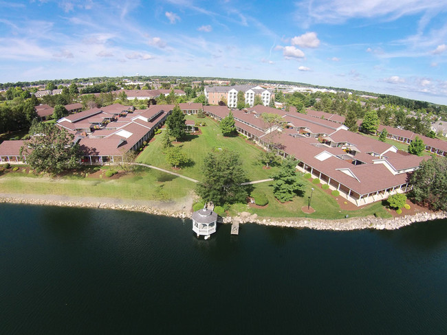 over all view with lake - Forest Meadows Villas / 55 & Older Community