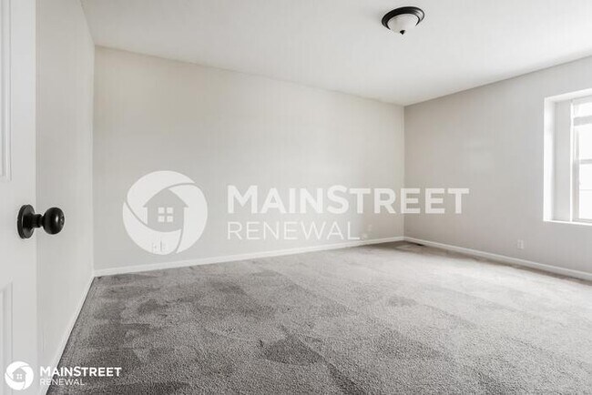 Building Photo - 411 Wiltshire Dr, Raymore, MO 64083