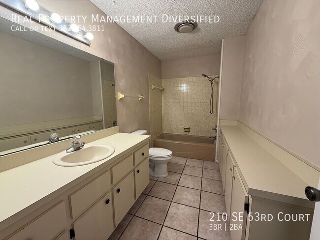 Building Photo - 210 SE 53rd Ct