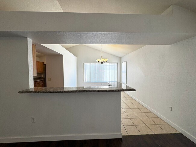 Building Photo - 3 BEDROOM WITH FIREPLACE AND LVP PLANK FLO...