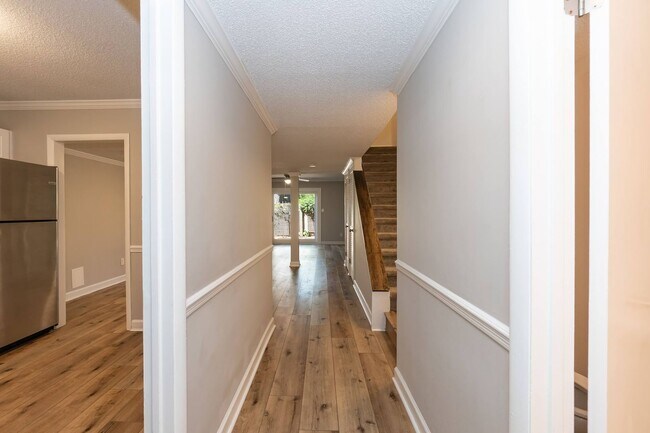 Building Photo - Fully Renovated 2BR Townhome-Style Condo – Available Now!