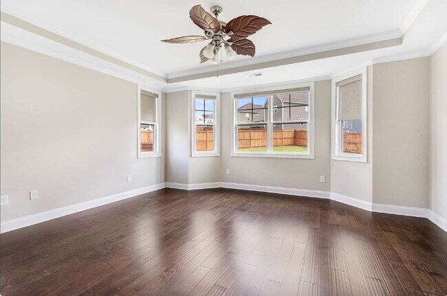 Building Photo - Luxurious 4-Bedroom Retreat with Third Floor Bonus Room & Fenced-in Backyard