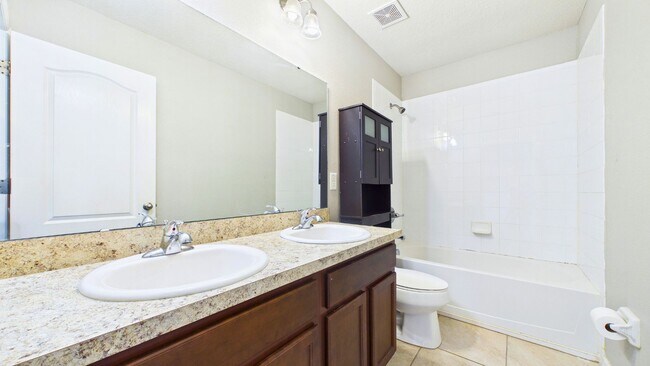 Building Photo - 4-Bedroom Home with Spacious Layout in Ayersworth Glen – Wimauma, FL