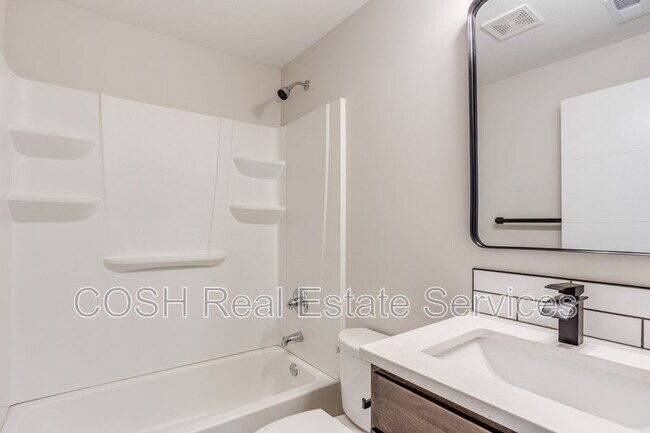 Building Photo - 8447 W 37th Ct N