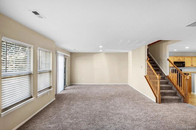 Building Photo - Bright Open-Concept Condo with 1-Car Garage in Prime Commuter Location
