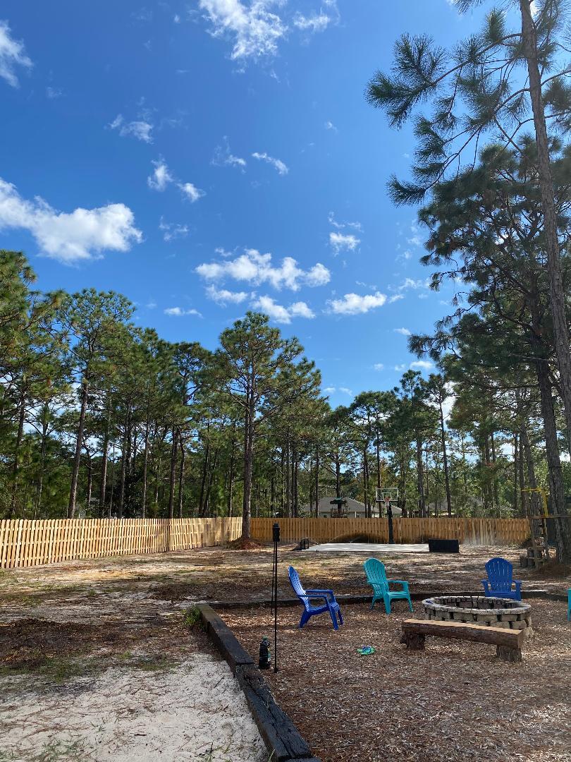 Backyard view from covered porch - 9009 Quail Roost Dr