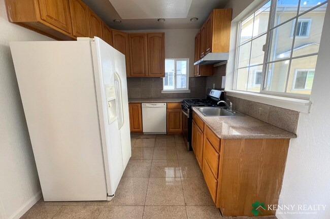 Building Photo - Spacious & Sunlit 5-Bedroom Retreat in the...