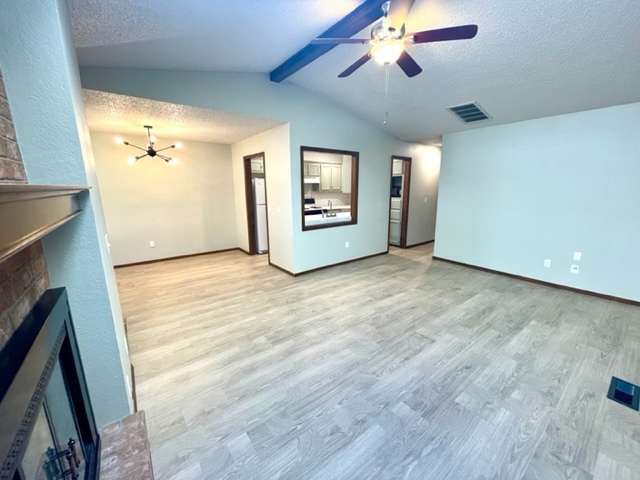 Skylight provides lots of light in living room - 8920 Fairfield Greens Dr