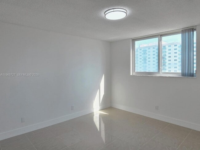 Building Photo - 19380 Collins Ave