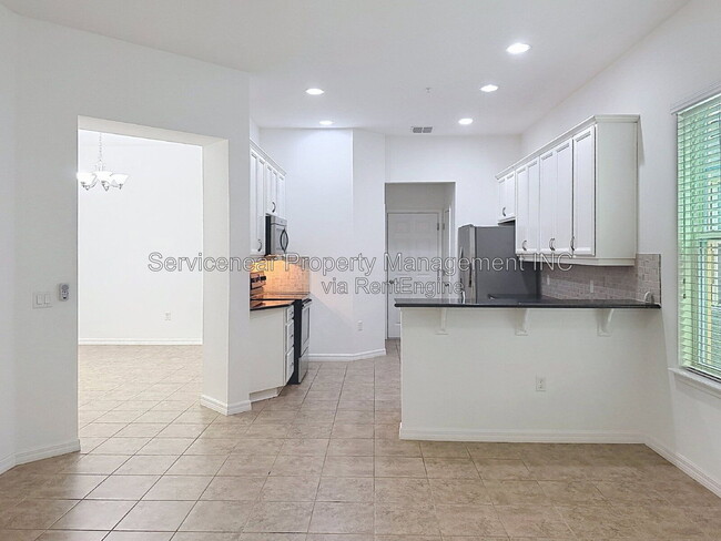 Building Photo - 9428 Woodcrane Dr