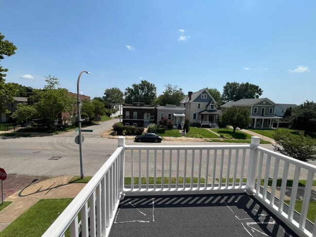 Building Photo - "Charming 4-Bed Duplex in St. Louis City 2nd Floor with Granite Countertops & Gleaming Hardwood F...