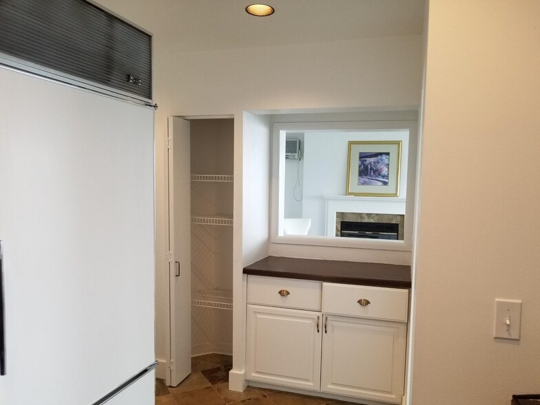 view of fireplace from kitchen - 1931 Broadway E