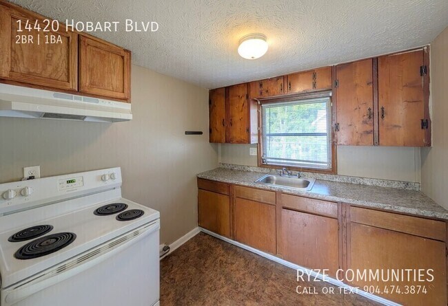 Building Photo - 14420 Hobart Blvd