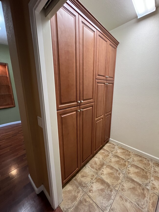 Cabinets in laundry room - 5909 Silveroak Cir