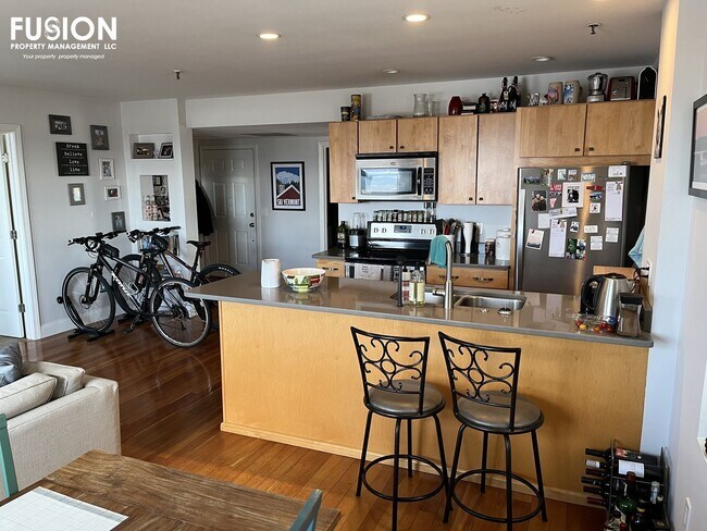 Building Photo - STUNNING LAKE VIEWS - Modern 2BR/2BA Corner Unit in The Vermont House