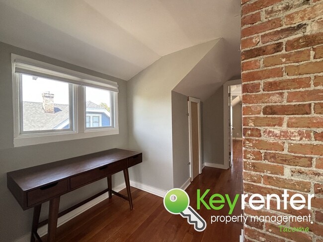 Building Photo - Timeless Charm Meets Modern Living in This...