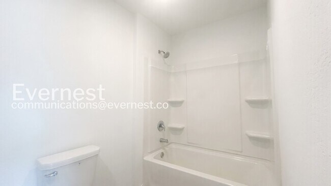 Building Photo - Spacious Home with Fenced Yard and Attached Garage / 3 beds 2 baths / Available now