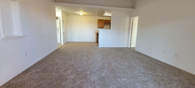 Building Photo - $500 OFF MOVE-IN! 2 Bedroom Condo near Air...