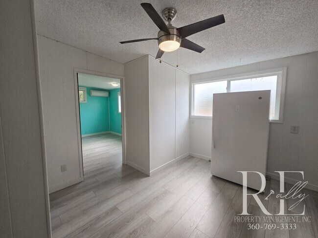 Building Photo - Private Beach Access – Bright, Breezy Livi...