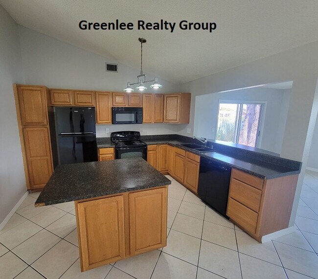 Building Photo - Relax by the water in this spacious 2-bedroom home with a 2-car garage, nestled in the highly des...