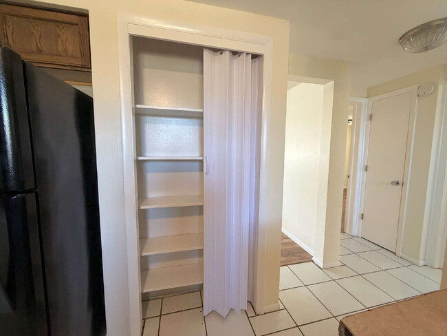 Building Photo - New Port Richey Home with Cozy 970 Sq Ft Layout!