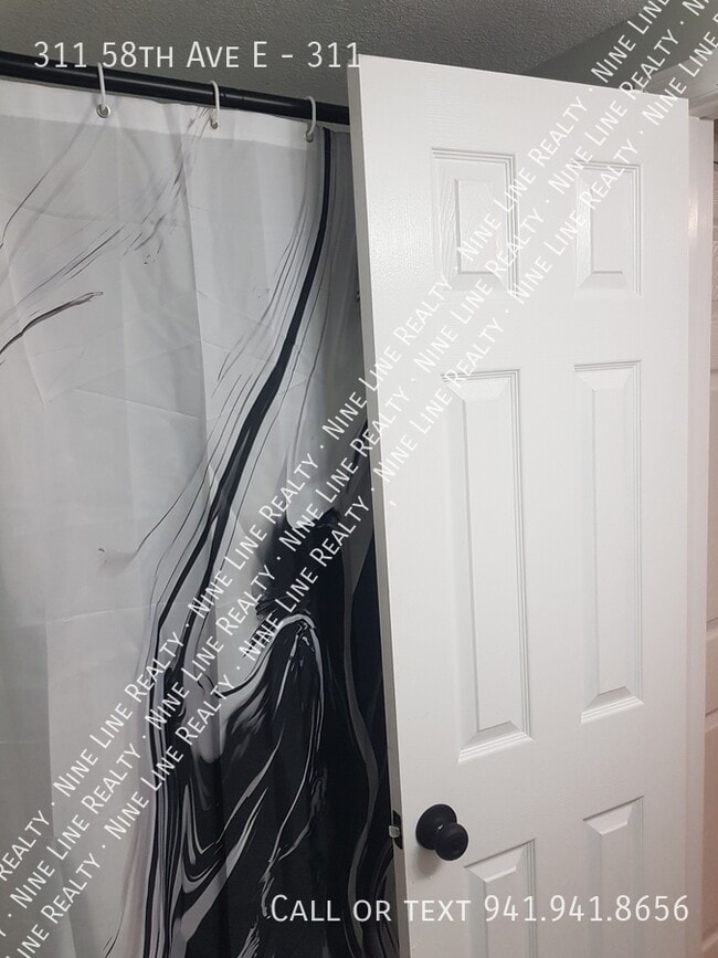 Building Photo - 311 58th Ave E