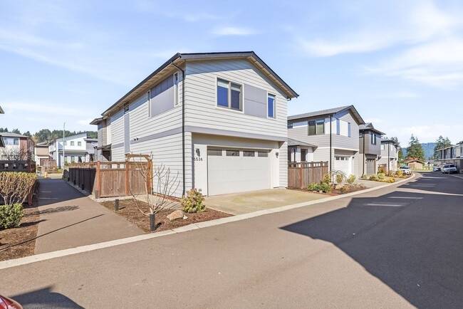 Building Photo - Modern Happy Valley Home with Designer Finishes & Spacious Open Layout